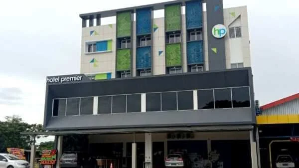 Sorotan Publik: Hotel d’Premier Diduga Langgar Aturan Lingkungan dan PSU, Sampah Membusuk di Jalur Provinsi Makassar