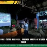 Jaga Kamtibmas Tetap Kondusif, Babinsa Dampingi Warga Nobar Piala Dunia